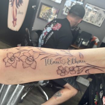 Lucky Cat Tattoo - Family birth flowers- me and my husband Daffodils (March) and violets (Feb) - Tattoo Near Me - Las Vegas, Nevada Lucky Cat Tattoo - Family birth flowers- me and my husband Daffodils (March) and violets (Feb) - Tattoo Near Me - Las Vegas, Nevada