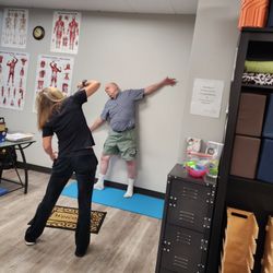 Pain Free Posture Clinic - Demonstrating movement helps each client to get it right !!