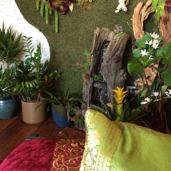 Spa Soleil Massage - Water gurgling in corner of lobby with colorful pillows and fabrics. - Day Spas Near Me - Venice, California