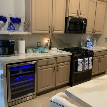 Legacy Granite Designs - Porcelain Countertop extended to accommodate wine cooler.  Also porcelain shelf added and porcelain backsplash.. - Countertop Installation Near Me - Austin, Texas