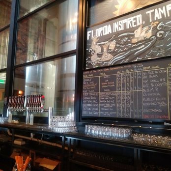 Coppertail Brewing Co - Beer tanks and chock board menu on the front wall. - Bars Near Me - Tampa, Florida Coppertail Brewing Co - Beer tanks and chock board menu on the front wall. - Bars Near Me - Tampa, Florida