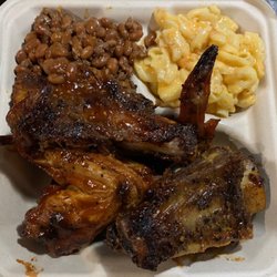 Family Blessings BBQ & Catering - BBQ chicken and BBQ beef ribs with Mac n' cheese and baked beans.
