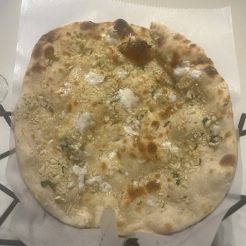 Bombay Velvet - Garlic Naan - Indian Near Me - Reston, Virginia Bombay Velvet - Garlic Naan - Indian Near Me - Reston, Virginia