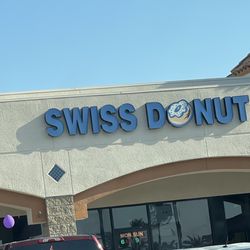 Swiss Donuts - This sign on door says 6-9 M-Sun. it is 5:41 and they are not open.