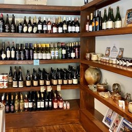 shelves of wine in a wine shop shelves of wine in a wine shop