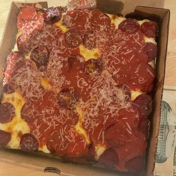 Down North Pizza - Pizza for scale next to a bill - Pizza Near Me - Philadelphia, Pennsylvania