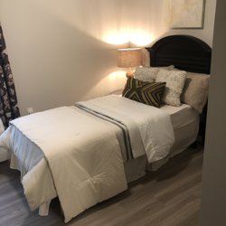 Silver Treasures at Orange Park - Boutique Style Assisted Living - Bedroom in our model Maple Suite
