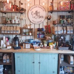 Round Barn Trading Company - Coffee accouterments. Flavored grounds, Java socks, coffee lover water bottle stickers etc...