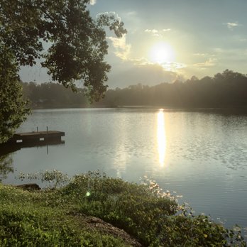 Emerald Lake Naturist Resort - A beautiful sunset over the lake. - Resorts Near Me - Porter, Texas