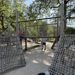 Billy Johnson Playground - Spider web climbing, holes large enough for adult sized feet