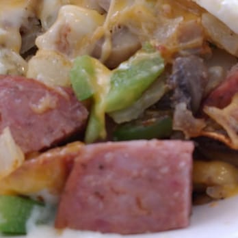 The Village Grill - Good amount of smoked sausage and mushrooms in the Country Skillet - Diners Near Me - Arlington Heights, Illinois The Village Grill - Good amount of smoked sausage and mushrooms in the Country Skillet - Diners Near Me - Arlington Heights, Illinois