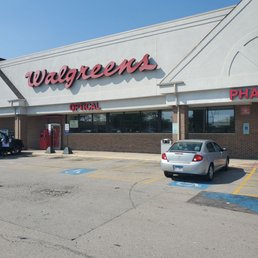 a car parked in front of the store