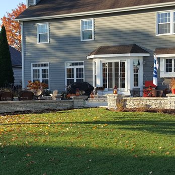 Figgins Trees & Turf - a house in the fall - Landscaping Near Me - Oswego, Illinois