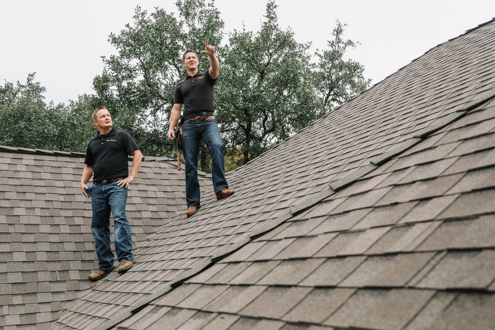 Slide of Yuras Roofing