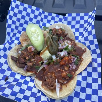 Toby's Tacos - two tacos on a checkered paper - Tacos Near Me Toby's Tacos - two tacos on a checkered paper - Tacos Near Me