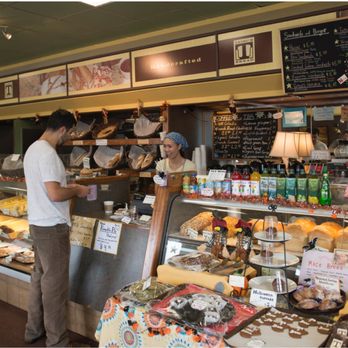 Tatsu's Bread - a man standing in front of the counter - Bakeries Near Me - Etobicoke, Ontario