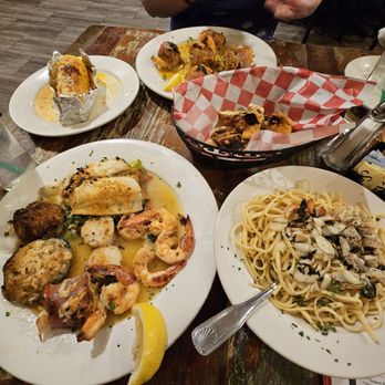 Popei's Clam Bar - Our table filled with amazing seafood. - Seafood Near Me - Bethpage, New York Popei's Clam Bar - Our table filled with amazing seafood. - Seafood Near Me - Bethpage, New York