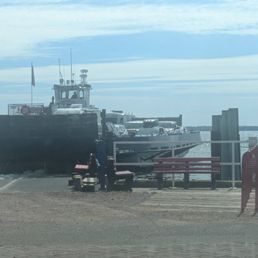Ferry pulling up to the dock Ferry pulling up to the dock