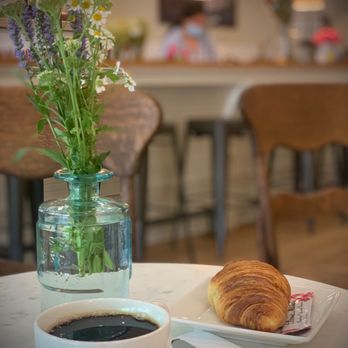 Hudson Roastery - a cup of coffee and a croissant - Coffee Roasteries Near Me - Hudson, New York