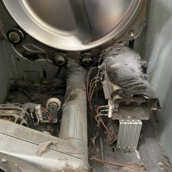 Andrew Appliance Repair - Burning smell in dryer. Could be a fire. Dryer should be cleaned every year.
