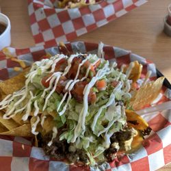 Lupe's Tacos - Loaded nachos with asada