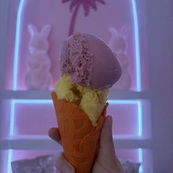 Mango and strawberry with an orange cone.