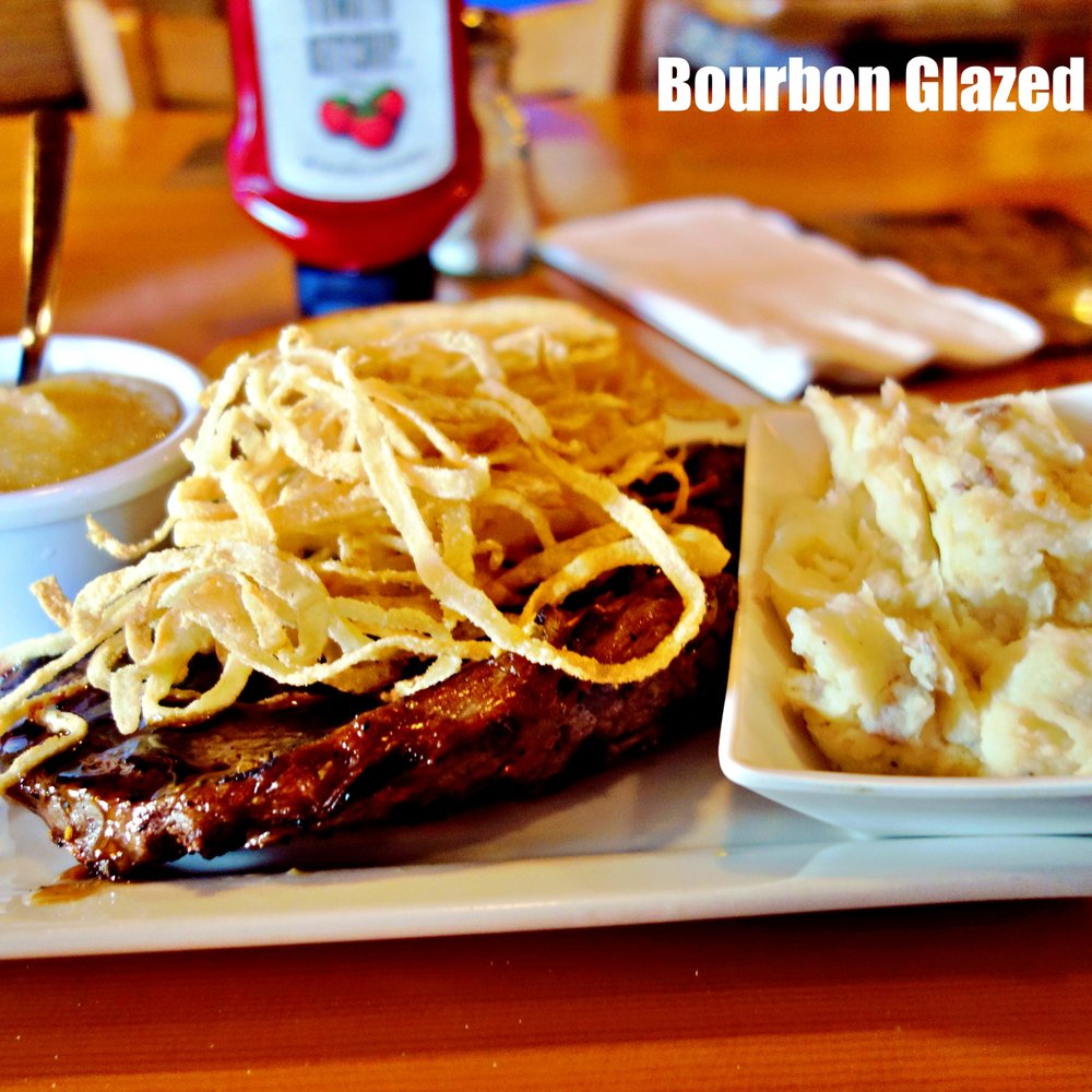 Bungalow Inn - a plate of food including a steak, potatoes, and gravy - Breakfast & Brunch Near Me - Manistee, Michigan Bungalow Inn - a plate of food including a steak, potatoes, and gravy - Breakfast & Brunch Near Me - Manistee, Michigan