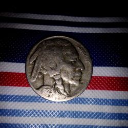 Tom's Pawn - Buy buffalo nickel that one has a date on it I don't know it's worth any money or not