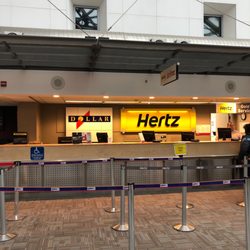 Dollar Car Rental - Front of Dollar/Hertz car rental desks