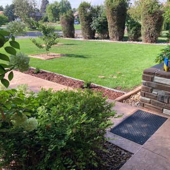 Magnolia Landscaping - a view of the back yard - Lawn Services Near Me Magnolia Landscaping - a view of the back yard - Lawn Services Near Me
