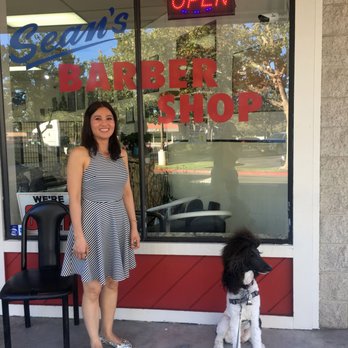 Sean's Barber Shop - Mary with 'Miss Parti' who is looking at another customer walking down the sidewalk to Sean's Barbershop! - Barbers Near Me - Fremont, California Sean's Barber Shop - Mary with 'Miss Parti' who is looking at another customer walking down the sidewalk to Sean's Barbershop! - Barbers Near Me - Fremont, California