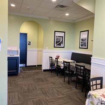 Chicken Salad Chick - a dining room with tables and chairs - Southern Near Me - Leland, North Carolina Chicken Salad Chick - a dining room with tables and chairs - Southern Near Me - Leland, North Carolina