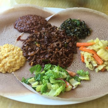 Kaffa Crossing - Beef tip and vegetarian combo. Super refreshing and tasty. The yellow beans on the left is my fav - Ethiopian Near Me - Philadelphia, Pennsylvania Kaffa Crossing - Beef tip and vegetarian combo. Super refreshing and tasty. The yellow beans on the left is my fav - Ethiopian Near Me - Philadelphia, Pennsylvania