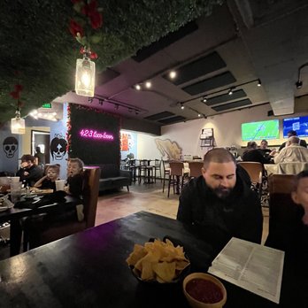 423 Taco - a man sitting at a table in a restaurant - Tacos Near Me - Chattanooga, Tennessee