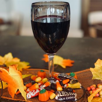 Compass Bar and Chill - a glass of wine and candy - Bars Near Me - Bradenton, Florida