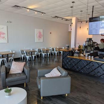 MIU Cafe - seating area with tables and chairs - Vietnamese Near Me - Manchester, New Hampshire