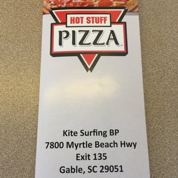 Hot Stuff Pizza - a sign for hot stuff pizza - Pizza Near Me - Gable, South Carolina