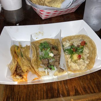 Taqueria La Lucha - From left to right: El sol taco, bistec taco, and fish taco. - Tacos Near Me - New Orleans, Louisiana Taqueria La Lucha - From left to right: El sol taco, bistec taco, and fish taco. - Tacos Near Me - New Orleans, Louisiana