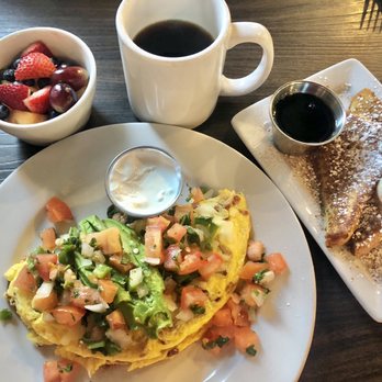 The Butter House - Cali style omelette topped with fresh pico de Gallo and add sour cream. With fruit and one piece of French toast. - Breakfast & Brunch Near Me - Seaside, California The Butter House - Cali style omelette topped with fresh pico de Gallo and add sour cream. With fruit and one piece of French toast. - Breakfast & Brunch Near Me - Seaside, California