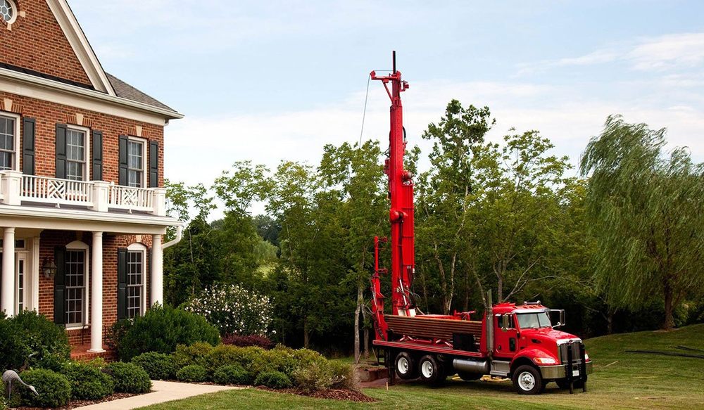 Slide of Hall & Sons Well Drilling