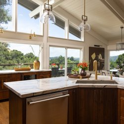 Douglah Designs - This Lafayette renovation restores mid-century character with warm natural materials, fine craftsmanship, and understated modern luxury.