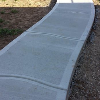 Cesars Concrete - 70 ft long curved sidewalk, runs from back patio of the house to a detached garage in the back of the house. - Masonry/Concrete Near Me - Loveland, Colorado Cesars Concrete - 70 ft long curved sidewalk, runs from back patio of the house to a detached garage in the back of the house. - Masonry/Concrete Near Me - Loveland, Colorado