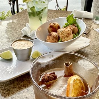 Hemingway's Tavern - Seasonal old fashioned and perfectly balanced mojito - incredibly delicious conch fritters - New American Near Me - Melbourne, Florida Hemingway's Tavern - Seasonal old fashioned and perfectly balanced mojito - incredibly delicious conch fritters - New American Near Me - Melbourne, Florida