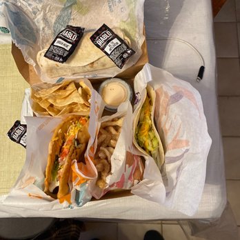 Taco Bell - Opened box withChalupa / Soft Taco / Veggie Burrito chips - Fast Food Near Me - Vestal, New York