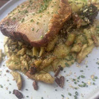 Molotov Kitschen and Cocktails - Spring Porchetta Paprikash green paprikash sauce, fermented sorrel, herbed spaetzle - Modern European Near Me - Denver, Colorado