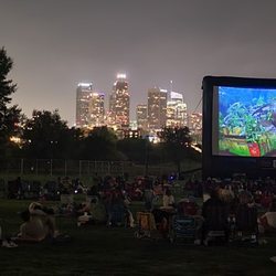 Eat See Hear - "Jurassic Park": DTLA in the background (07/29/22). #Chinatown @EatSeeHear @StarliteCinemas #OutdoorEntertainment #Movies #Music #Food