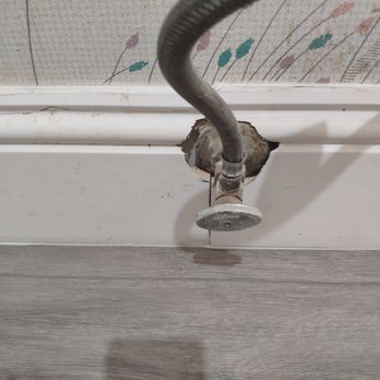 Dolphin Carpet & Tile - Baseboard cut in half and then glued back together instead of hole saw. - Carpeting Near Me - Pembroke Pines, Florida