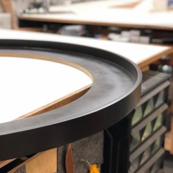 Abuela Art Framing - Handcrafted round frames that perfectly complement your unique artwork.