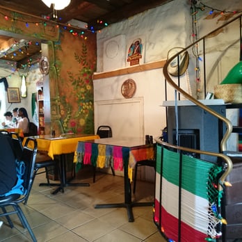 Senor Sombrero - a dining area with tables and chairs - Mexican Near Me - Quebec City, Quebec Senor Sombrero - a dining area with tables and chairs - Mexican Near Me - Quebec City, Quebec