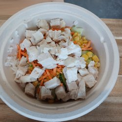 Emoji Poke - Chicken bowl with white rice, corn, cucumbers and carrots